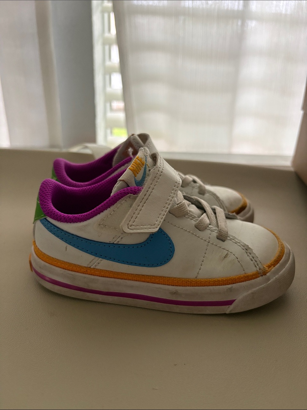 Nike Kids White Sneakers with Blue Swoosh & Purple Lining
